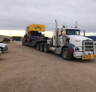 Hauling large equipment on a trailer