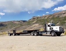 KP Squared truck and trailer providing heavy hauling services